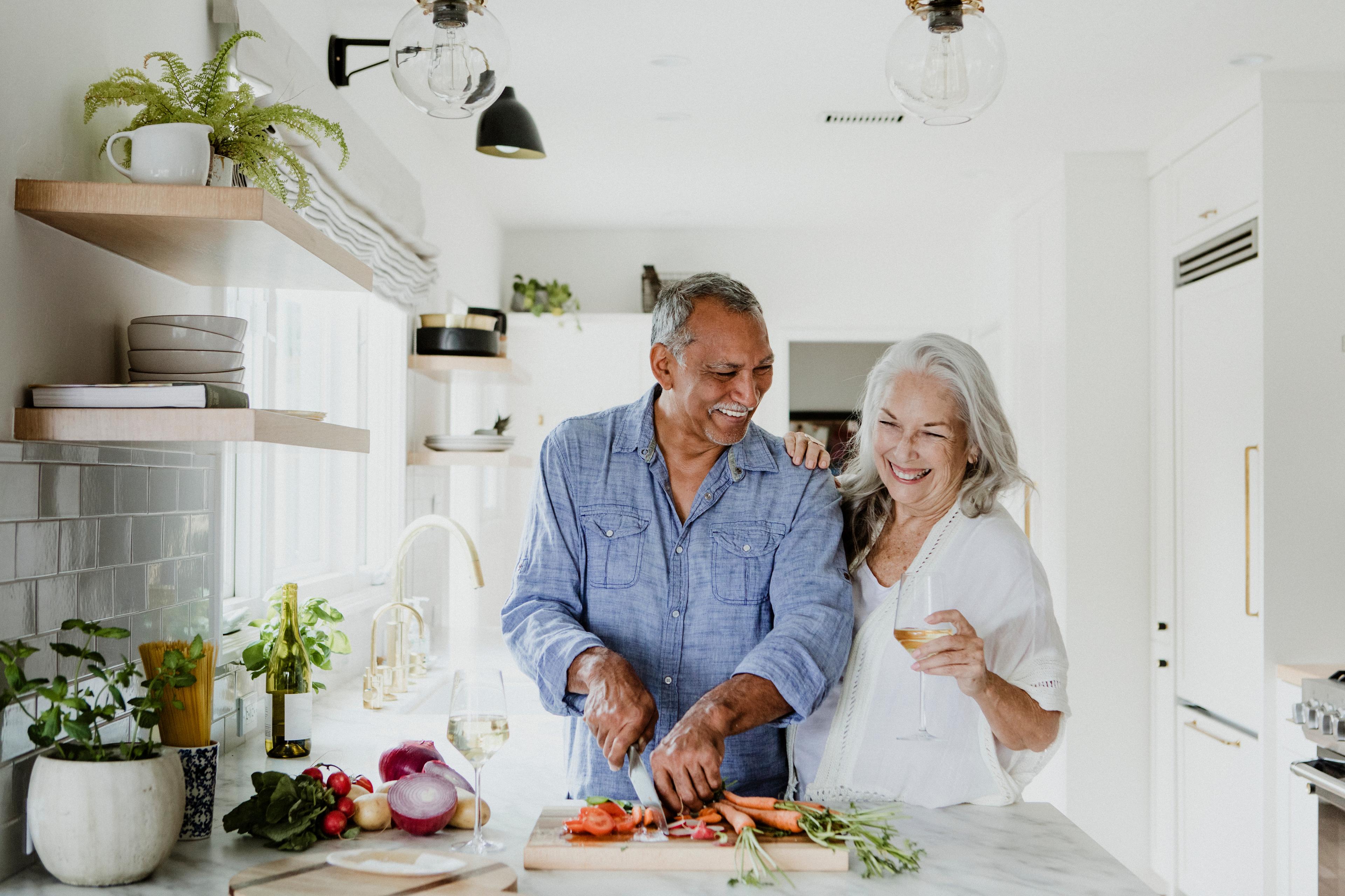 Couple cooking together.